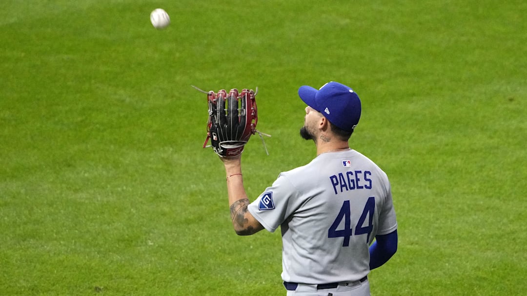 Oct 14, 2025; Milwaukee, Wisconsin, USA; Los Angeles Dodgers center fielder Andy Pages (44) makes a catch against the Milwaukee Brewers in the fourth inning during game two of the NLCS round for the 2025 MLB playoffs at American Family Field. Mandatory Credit: Michael McLoone-Imagn Images