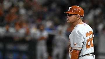 Texas' head baseball coach David Pierce stands on the third base line at the game against Texas A&M-Corpus Christi, Tuesday, Feb. 22, 2022, at Whataburger Field. Texas won, 12-0.
