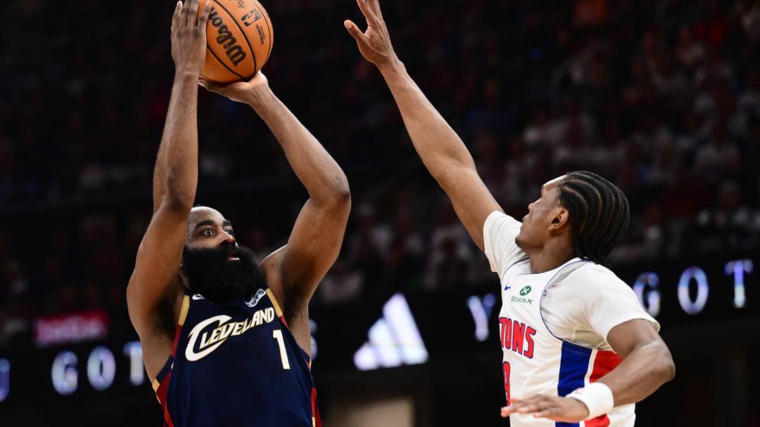 May 11, 2026; Cleveland, Ohio, USA; Cleveland Cavaliers guard James Harden (1) shoots over the defense of  Detroit Pistons guard Ausar Thompson (9) during the second half of game four in the second round of the 2026 NBA Playoffs at Rocket Arena. Mandatory Credit: Ken Blaze-Imagn Images