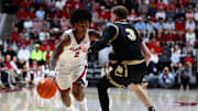 Nov 13, 2025; Tuscaloosa, Alabama, USA; Alabama Crimson Tide guard Aden Holloway (2) dribbles against Purdue Boilermakers guard Braden Smith (3) during the second half at Coleman Coliseum. Mandatory Credit: David Leong-Imagn Images