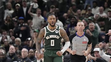 Apr 25, 2025; Milwaukee, Wisconsin, USA; Milwaukee Bucks guard Damian Lillard (0) reacts after making a basket against the Indiana Pacers in the second half during game three of first round for the 2024 NBA Playoffs at Fiserv Forum. Mandatory Credit: Michael McLoone-Imagn Images