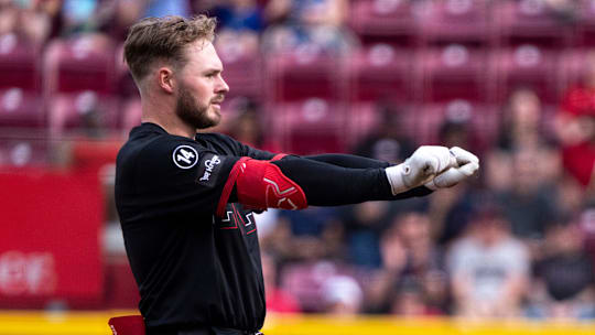 Cincinnati Reds designated hitter Gavin Lux (2) gestures to the Cincinnati Reds dugout after hitting a double in the third inning of the MLB game between Cincinnati Reds and Cleveland Guardians at Great American Ball Park in Cincinnati on Friday, May 16, 2025.