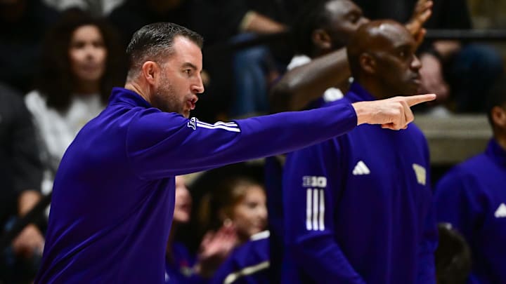 Jan 7, 2026; West Lafayette, Indiana, USA;  Washington Huskies head coach Danny Sprinkle reacts to game action ]during the second half against the Purdue Boilermakers at Mackey Arena. Mandatory Credit: Marc Lebryk-Imagn Images