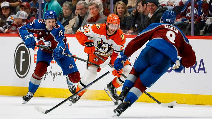 Jan 21, 2026; Denver, Colorado, USA; Anaheim Ducks center Jansen Harkins (24) controls the puck under pressure from Colorado Avalanche left wing Taylor Makar (16) and defenseman Cale Makar (8) in the third period at Ball Arena. Mandatory Credit: Isaiah J. Downing-Imagn Images