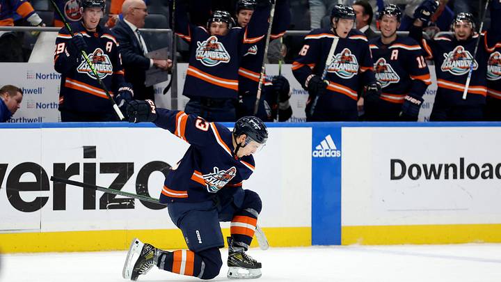 Jan 28, 2023; Elmont, New York, USA; New York Islanders center Mathew Barzal (13) celebrates his game winning goal against the Vegas Golden Knights with teammates during overtime at UBS Arena. Mandatory Credit: Brad Penner-USA TODAY Sports