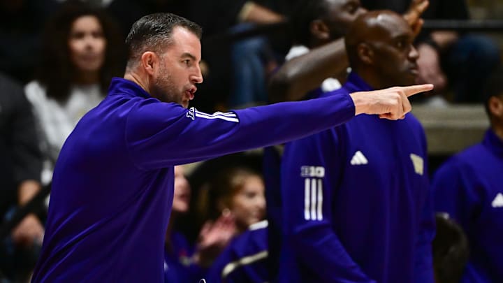 Jan 7, 2026; West Lafayette, Indiana, USA;  Washington Huskies head coach Danny Sprinkle reacts to game action ]during the second half against the Purdue Boilermakers at Mackey Arena. Mandatory Credit: Marc Lebryk-Imagn Images