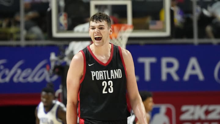 Jul 15, 2024; Las Vegas, NV, USA; Portland Trail Blazers center Donovan Clingan (23) reacts to a play against the Philadelphia 76ers during the second half at Thomas & Mack Center. Mandatory Credit: Lucas Peltier-USA TODAY Sports