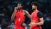 Nov 16, 2025; Dallas, Texas, USA;  Portland Trail Blazers forward Jerami Grant (9) and Portland Trail Blazers guard Shaedon Sharpe (17) chat during the second quarter against the Dallas Mavericks at American Airlines Center. Mandatory Credit: Kevin Jairaj-Imagn Images