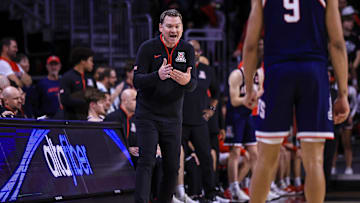 Jan 4, 2025; Cincinnati, Ohio, USA; Arizona Wildcats head coach Tommy Lloyd reacts after a play against the Cincinnati Bearcats in the second half at Fifth Third Arena. Mandatory Credit: Katie Stratman-Imagn Images