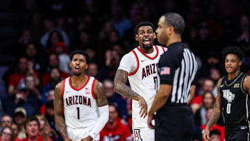 Jan 11, 2025; Tucson, Arizona, USA; Arizona Wildcats guard KJ Lewis (5) and guard Caleb Love (1) both yell toward the referee after a call was made during the second half of the game against the UCF Knights at McKale Center. Mandatory Credit: Aryanna Frank-Imagn Images