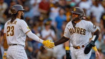 Jul 29, 2023; San Diego, California, USA;  San Diego Padres catcher Luis Campusano (12) celebrates with San Diego Padres right fielder Fernando Tatis Jr. (23) after scoring a run during the second inning against the Texas Rangers at Petco Park. Mandatory Credit: David Frerker-USA TODAY Sports