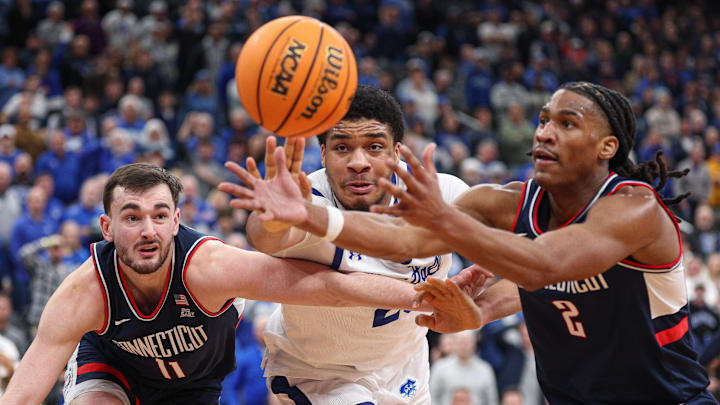  UConn Huskies forward Alex Karaban and guard Silas Demary Jr. 