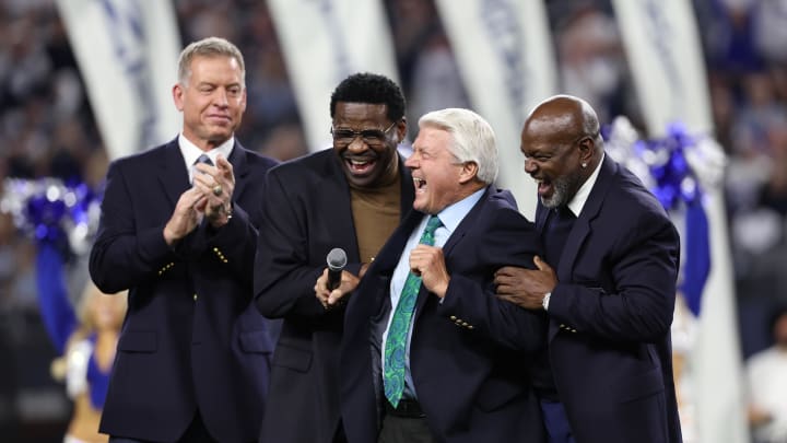 Dec 30, 2023; Arlington, Texas, USA;  Dallas Cowboys former head coach Jimmy Johnson laughs with former players Troy Aikman and Michael Irvin and Emmitt Smith after being inducted into the ring of honor at halftime of the game against the Detroit Lions at AT&T Stadium. Mandatory Credit: Kevin Jairaj-USA TODAY Sports