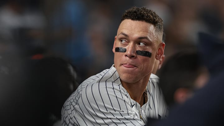 Sep 13, 2024; Bronx, New York, USA; New York Yankees center fielder Aaron Judge (99) looks back from the dug out during the third inning against the Boston Red Sox at Yankee Stadium. Mandatory Credit: Vincent Carchietta-Imagn Images