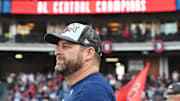 Sep 28, 2025; Cleveland, Ohio, USA;  Cleveland Guardians manager Stephen Vogt (12) watches the flag raising after the Guardians beat the Texas Rangers and won the American League Central Division at Progressive Field. Mandatory Credit: Ken Blaze-Imagn Images