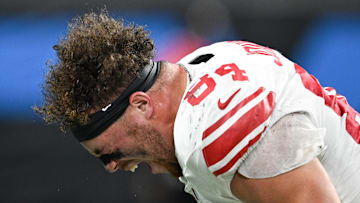 New York Giants tight end Theo Johnson was fined for unnecessary roughness in the Giants' Week 13 loss to New England.