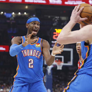 Nov 2, 2025; Oklahoma City, Oklahoma, USAOklahoma City Thunder guard Shai Gilgeous-Alexander (2) yells for the ball after Oklahoma City Thunder center Isaiah Hartenstein (55) grabs a rebound during the first quarter against the New Orleans Pelicans at Paycom Center. Mandatory Credit: Alonzo Adams-Imagn Images