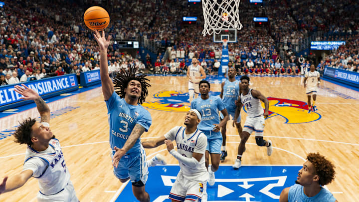 The Jayhawks held off a furious second-half comeback from the Tar Heels to notch a high-profile early-season win. The Jayhawks held off a furious second-half comeback from the Tar Heels to notch a high-profile early-season win.
