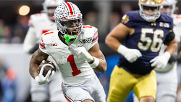 Jan 20, 2025; Atlanta, GA, USA; Ohio State Buckeyes running back Quinshon Judkins (1) against the Notre Dame Fighting Irish during the CFP National Championship college football game at Mercedes-Benz Stadium. 
