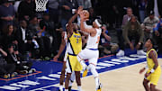 New York Knicks guard Josh Hart (3) shoots against Indiana Pacers center Thomas Bryant (3) in the first quarter during game one of the eastern conference finals for the 2025 NBA Playoffs at Madison Square Garden.