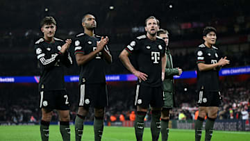 Disappointed Bayern Munich players applauding visiting fans after the defeat against Arsenal on matchday 5 of the Champions League.