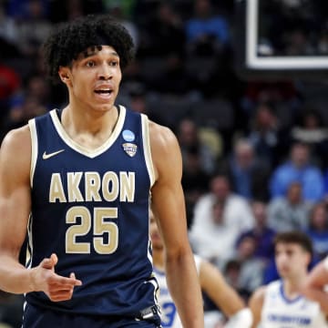 Mar 21, 2024; Pittsburgh, PA, USA; Akron Zips forward Enrique Freeman (25) reacts after a play during the first half of the game against the Creighton Bluejays in the first round of the 2024 NCAA Tournament at PPG Paints Arena. Mandatory Credit: Charles LeClaire-USA TODAY Sports