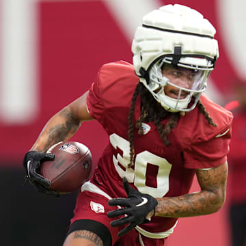 Arizona Cardinals receiver Xavier Weaver (30) catches a pass during training camp at State Farm Stadium on Aug 6, 2024, in Glendale, Ariz.