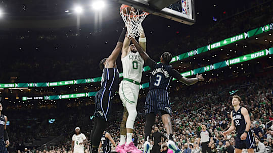 Tatum took a tumble after a hard foul from KCP