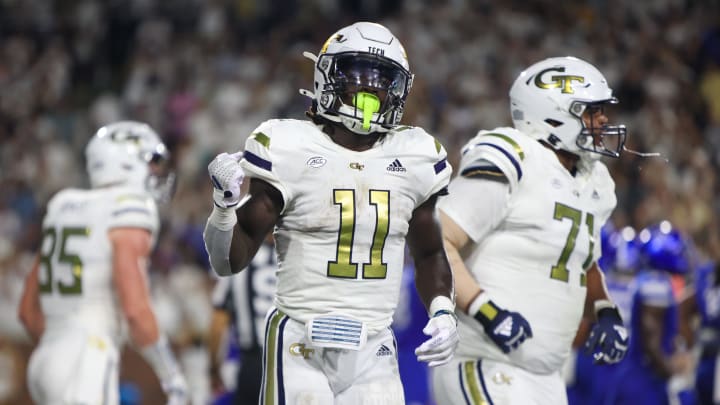 Aug 31, 2024; Atlanta, Georgia, USA; Georgia Tech Yellow Jackets running back Jamal Haynes (11) celebrates after a touchdown run against Georgia State Panthers in the first quarter at Bobby Dodd Stadium at Hyundai Field. Mandatory Credit: Brett Davis-USA TODAY Sports