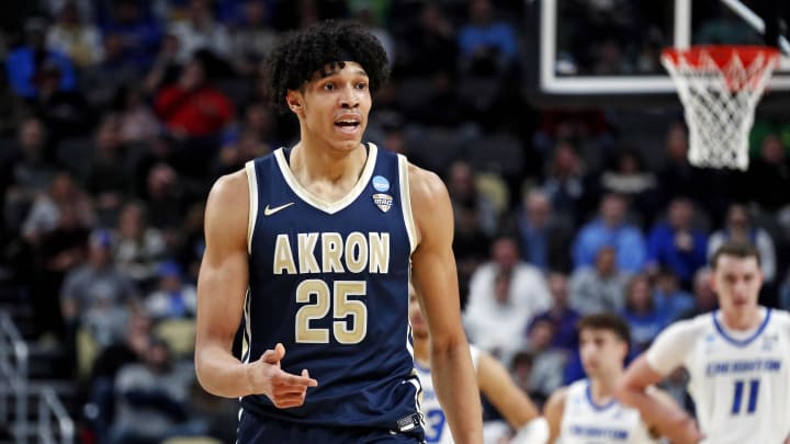 Mar 21, 2024; Pittsburgh, PA, USA; Akron Zips forward Enrique Freeman (25) reacts after a play during the first half of the game against the Creighton Bluejays in the first round of the 2024 NCAA Tournament at PPG Paints Arena.