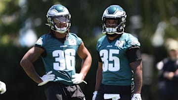 May 30, 2024; Philadelphia, PA, USA; Philadelphia Eagles running back Tyrion Davis-Price (35) and running back Kendall Milton (36) look on at practice at NovaCare Complex. Mandatory Credit: Bill Streicher-Imagn Images