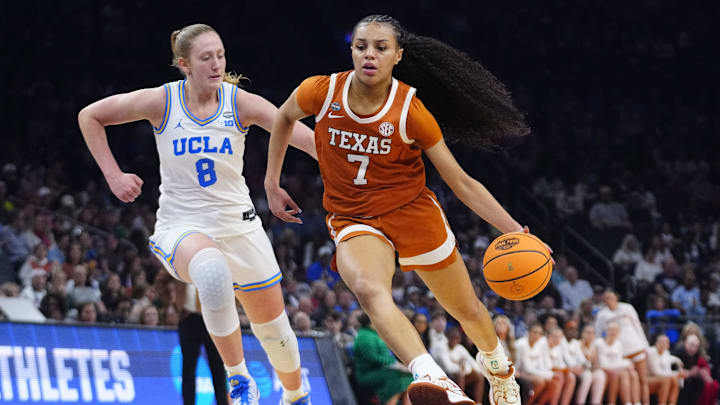 Texas guard Jordan Lee (7) dribbles against UCLA guard Gianna Kneepkens (8) at Mortgage Matchup Center during the Women's Final Four in Phoenix on April 3, 2026.