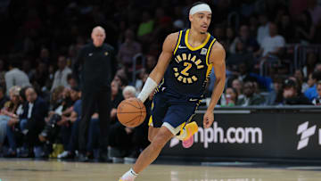 Feb 28, 2025; Miami, Florida, USA; Indiana Pacers guard Andrew Nembhard (2) drives to the basket against the Miami Heat during the second quarter at Kaseya Center. Mandatory Credit: Sam Navarro-Imagn Images