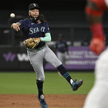 Seattle Mariners shortstop J.P. Crawford throws to first during a game against the St. Louis Cardinals on Friday at Busch Stadium.