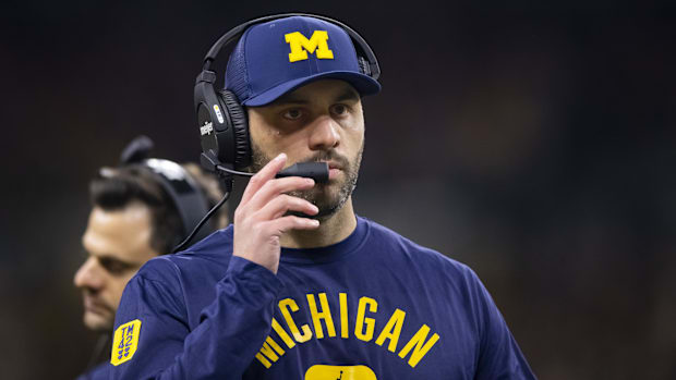 Michigan Wolverines quarterbacks coach Matt Weiss against the Iowa Hawkeyes.