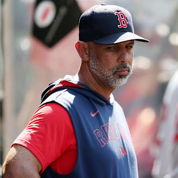 Jun 25, 2025; Anaheim, California, USA;  Boston Red Sox manager Alex Cora (13) looks down in the dugout during the eighth inning against the Los Angeles Angels at Angel Stadium. Mandatory Credit: Kiyoshi Mio-Imagn Images