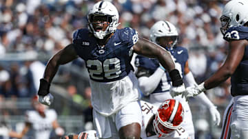 Penn State football defensive tackle Zane Durant reacts following a tackle