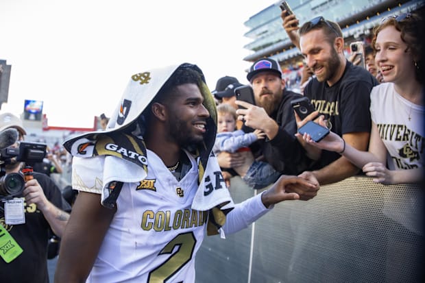 Oct 19, 2024; Tucson, Arizona, USA; Colorado Buffalos quarterback Shedeur Sanders (2) greets fans after defeating the Arizona