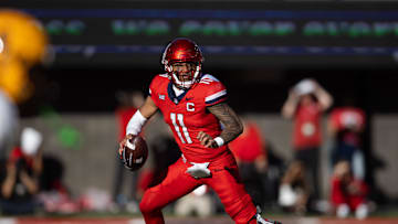 Nov 30, 2024; Tucson, Arizona, USA; Arizona Wildcats quarterback Noah Fifita (11) against the Arizona State Sun Devils during the Territorial Cup at Arizona Stadium. Mandatory Credit: Mark J. Rebilas-Imagn Images