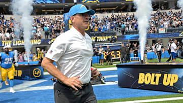 Sep 8, 2024; Inglewood, California, USA; Los Angeles Chargers head coach Jim Harbaugh leads the team on to the field for the game against the Las Vegas Raiders at SoFi Stadium.
