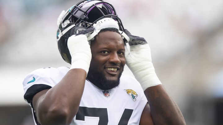 Sep 19, 2021; Jacksonville, Florida, USA; Jacksonville Jaguars offensive tackle Cam Robinson (74) against the Denver Broncos at TIAA Bank Field. Mandatory Credit: Mark J. Rebilas-USA TODAY Sports