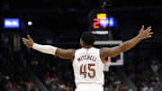 Dec 12, 2025; Washington, District of Columbia, USA; Cleveland Cavaliers guard Donovan Mitchell (45) reacts after scoring against the Washington Wizards in the fourth quarter at Capital One Arena. Mandatory Credit: Geoff Burke-Imagn Images