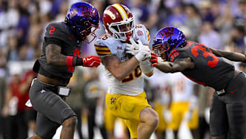 Nov 8, 2025; Fort Worth, Texas, USA; Iowa State Cyclones running back  (26) is tackled by TCU Horned Frogs safety Jamel Johnson (2) and safety  (36) during the second half at Amon G. Carter Stadium. Mandatory Credit: Jerome Miron-Imagn Images
