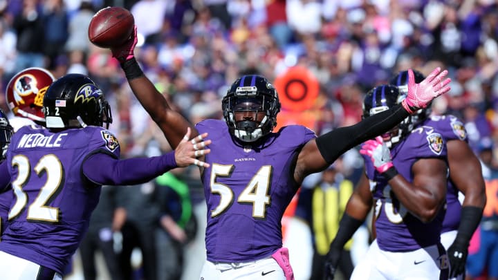 Oct 9, 2016; Baltimore, MD, USA;  Baltimore Ravens linebacker Zachary Orr (54) celebrates his fumble recovery against the Washington Redskins at M&T Bank Stadium. Mandatory Credit: Mitch Stringer-USA TODAY Sports