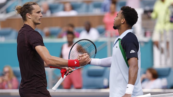 Tennis star Alexander Zverev meets at the net with Arthur Fils after their match at the Miami Open at Hard Rock Stadium Tennis star Alexander Zverev meets at the net with Arthur Fils after their match at the Miami Open at Hard Rock Stadium