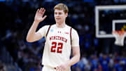 Mar 22, 2025; Denver, CO, USA; Wisconsin Badgers forward Steven Crowl (22) reacts against the Brigham Young Cougars during the second half in the second round of the NCAA Tournament at Ball Arena. 