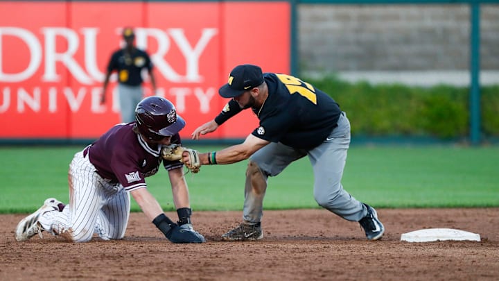 Missouri State's Jake McCutcheon is tagged out after over sliding second base as the Bears took on the Mizzou Tigers at Hammons Field on Tuesday, April 22, 2025.