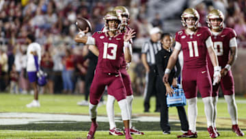 Nov 18, 2023; Tallahassee, Florida, USA; Florida State Seminoles quarterback Jordan Travis (13) throws a pass during the warm ups against the North Alabama Lions at Doak S. Campbell Stadium. Mandatory Credit: Morgan Tencza-Imagn Images