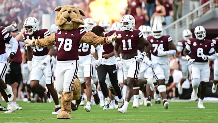 Mississippi State Bulldogs players run onto the field before the game against Eastern Kentucky Colonels at Davis Wade Stadium at Scott Field.