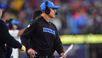 Dec 19, 2024; Inglewood, California, USA; Los Angeles Chargers head coach Jim Harbaugh watches game action before playing against the Denver Broncos during the first half at SoFi Stadium. 